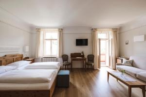 Posteľ alebo postele v izbe v ubytovaní Hotel Monte Sella + 37 fotografií