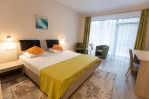 Postel nebo postele na pokoji v ubytování Hotel Nicoleta