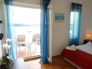 Postel nebo postele na pokoji v ubytování Trogir Yellow House