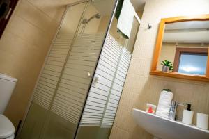 Ванная комната в Apartamento Timple +15 фотографий