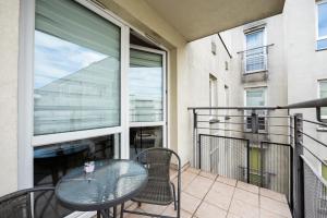 Balkón alebo terasa v ubytovaní Ursus Pleasant Apartment