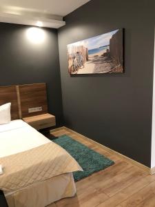 Cama ou camas em um quarto em Hotel Calipso Hotel