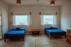 Postel nebo postele na pokoji v ubytování Casa Mirador Salina Cruz + 120 fotografií