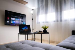 TV a/nebo společenská místnost v ubytování Apartamento Poleo