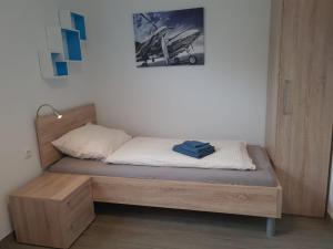 Ένα ή περισσότερα κρεβάτια σε δωμάτιο στο Haus Zeit für Mich