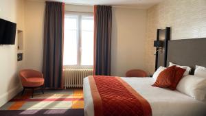 Rúm í herbergi á Hotel Bellevue