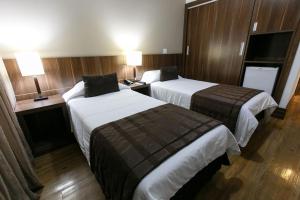 En eller flere senge i et værelse på Casablanca Center Hotel