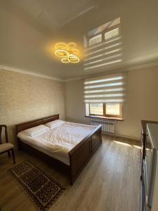 Guest House Tenir Too客房内的一张或多张床位