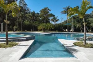 A piscina localizada em Embaúba Boutique Hotel ou nos arredores