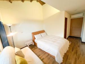 Fotografie z fotogalerie ubytování Jiufen Breeze 九份惠風民宿ｌ6人包棟小屋 v destinaci Ťiou-fen + 28 fotografií