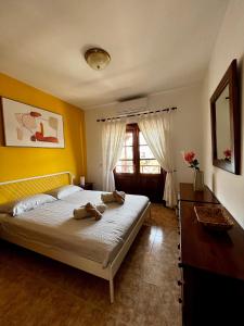Giường trong phòng chung tại Cozy Villa Marina, Iris fase 1, WiFi