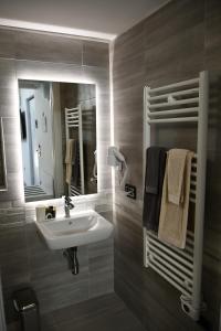 Koupelna v ubytování La casa del tempo - Urban resort + 61 fotografií