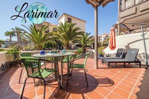 A patio or other outdoor area at LARIMAR en Balcon del Mar