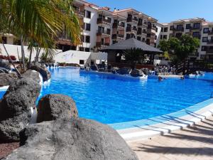 The swimming pool at or close to LARIMAR en Balcon del Mar
