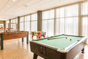 a billiard room with a pool table and a pool table at Ona Benidorm Poniente in Benidorm