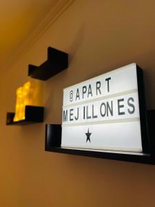 a sign that says a part meillones on a wall at Apart Mejillones - Dpto 24 in Mejillones