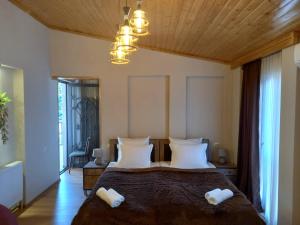 Letto o letti in una camera di Hotel and Restaurant "VILLA GIVISI"