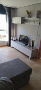 Ένα ή περισσότερα κρεβάτια σε δωμάτιο στο Apartamento en Malpica Costa da Morte