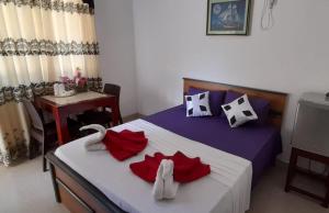 Postel nebo postele na pokoji v ubytování Paradise inn