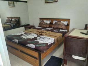 Postel nebo postele na pokoji v ubytování Paradise inn