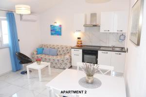 Kuchyň nebo kuchyňský kout v ubytování ONDINA apartments