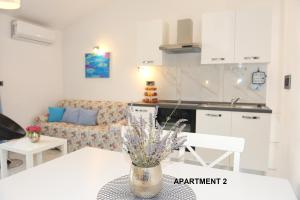 Kuchyň nebo kuchyňský kout v ubytování ONDINA apartments