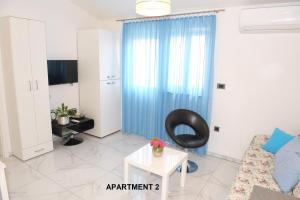 TV a/nebo společenská místnost v ubytování ONDINA apartments