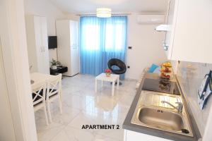 Kuchyň nebo kuchyňský kout v ubytování ONDINA apartments