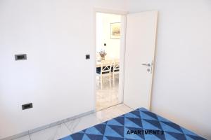 Postel nebo postele na pokoji v ubytování ONDINA apartments