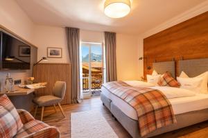 Postel nebo postele na pokoji v ubytování Gasthof-Hotel Dannerwirt