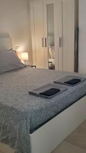 Posteľ alebo postele v izbe v ubytovaní B&B Lido Apartament 10A