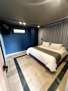 Letto o letti in una camera di Hotel D' Leon