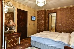 Postel nebo postele na pokoji v ubytování Imperial Resort
