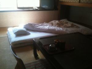 Katil atau katil-katil dalam bilik di Kamesei Ryokan
