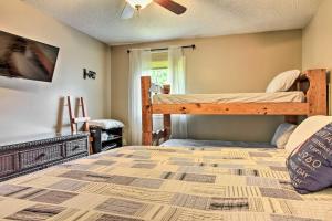 a bedroom with a bunk bed in a room at Cozy Condo with Magic Mountain Ski-In Access! in Londonderry