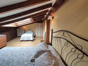 A bed or beds in a room at Casa Elvira