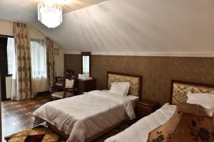 Postel nebo postele na pokoji v ubytování Imperial Resort