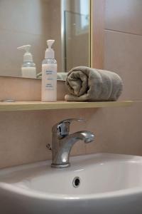 A bathroom at white house by the sea