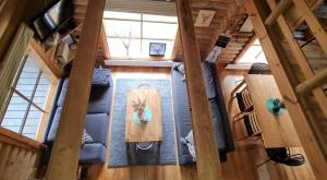an overhead view of a living room in a tiny house at NPLIHOUSE in Otepää