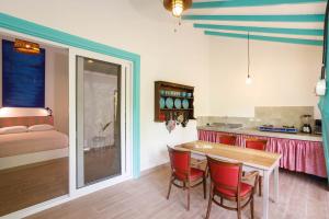 Kuchyň nebo kuchyňský kout v ubytování Villa Casa Azul & Arena Blanca Apartamentos