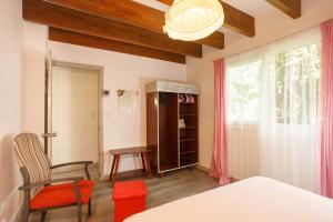 Postel nebo postele na pokoji v ubytování Villa Casa Azul & Arena Blanca Apartamentos