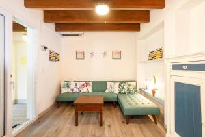 Postel nebo postele na pokoji v ubytování Villa Casa Azul & Arena Blanca Apartamentos