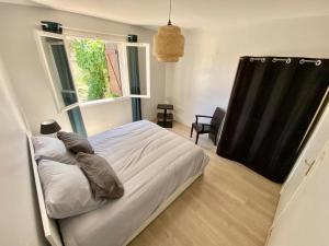 Posteľ alebo postele v izbe v ubytovaní Belle et grande villa pour des séjours en famille et entre amis