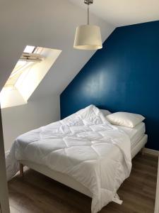 Ліжко або ліжка в номері Appartement 3 Étoiles - Plage des Phoques avec Parking Privé
