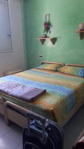 Posteľ alebo postele v izbe v ubytovaní Bella casa da Paola