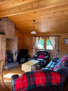 Posezení v ubytování Red Squirrel Lodge
