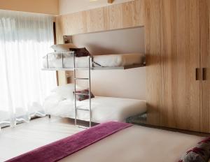 Posteľ alebo postele v izbe v ubytovaní Hotel El Molí