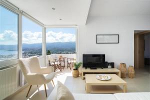 TV a/nebo společenská místnost v ubytování Mira Sitia Luxury Apartment