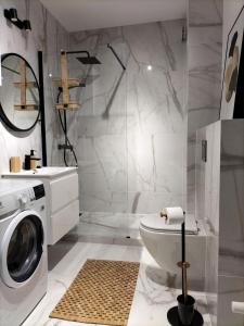 Kúpeľňa v ubytovaní Apartament Słoneczny 2