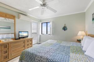 Ένα ή περισσότερα κρεβάτια σε δωμάτιο στο Sandy Getaway +21 φωτογραφίες